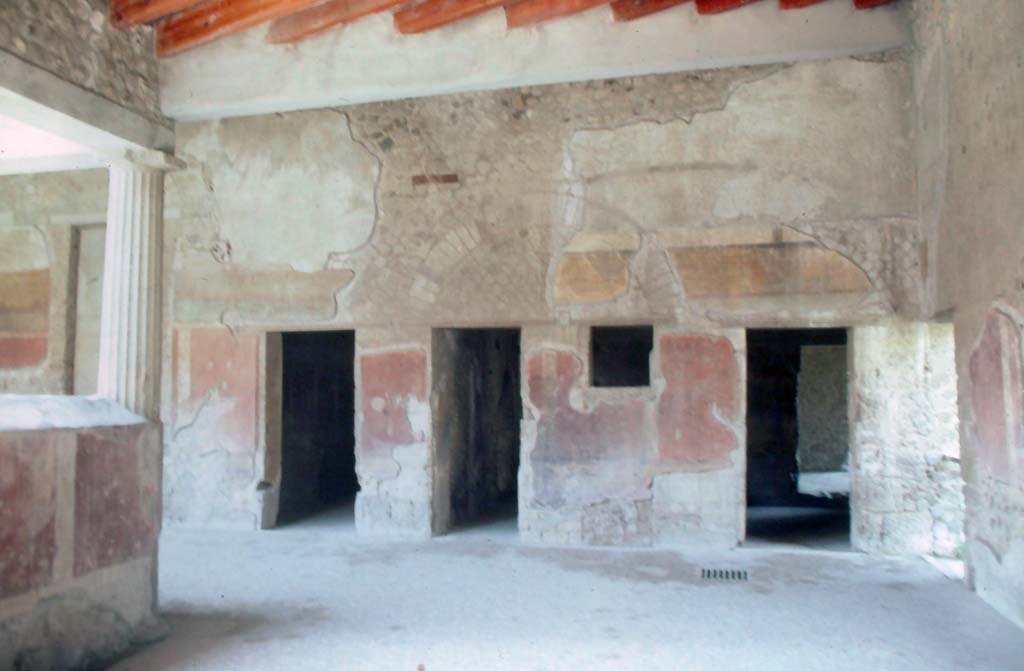 Villa dei Misteri, Pompeii. October 1981. Looking towards north-west corner of Peristyle A, from Peristyle D.
Doorways to rooms 19, (on left) 20, 21, and 26 (on right).
Photo courtesy of Rick Bauer, from Dr George Fay’s slides collection.