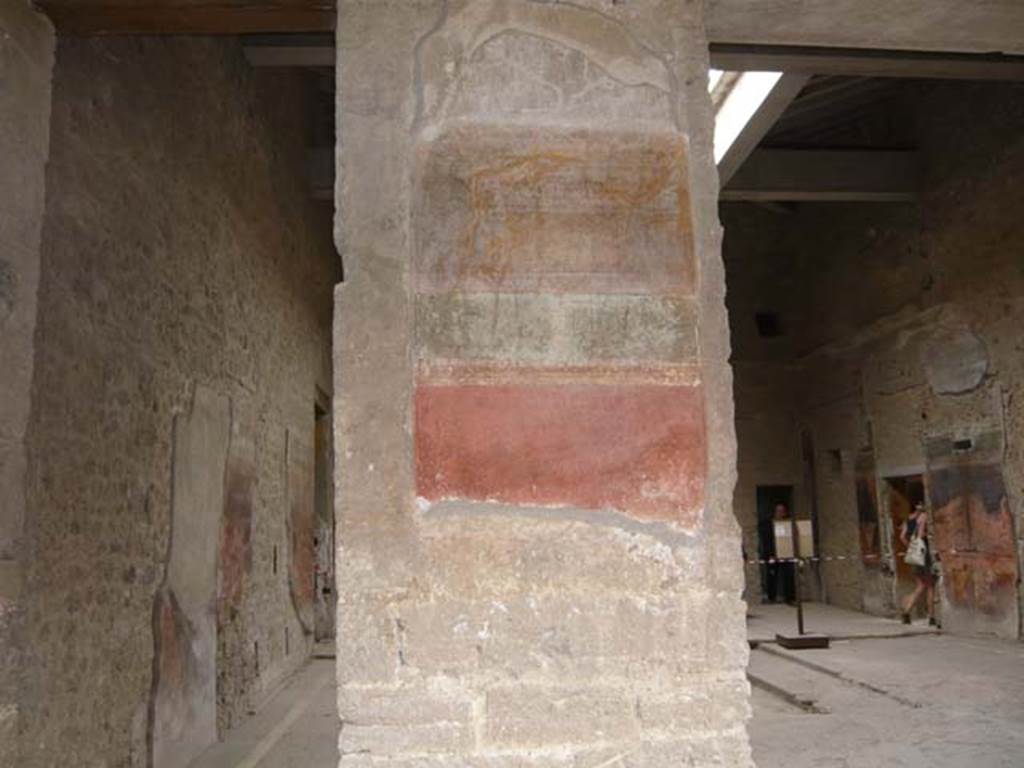 Villa of Mysteries, Pompeii. May 2012. Peristyle A, west wall with remains of wall decoration on south side of atrium entrance doorway and north side of side door into atrium, on right. Photo courtesy of Buzz Ferebee.