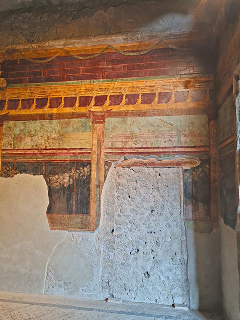 Villa of Mysteries, Pompeii. November 2023.
Room 6, east wall with blocked doorway at south end. Photo courtesy of Giuseppe Ciaramella.