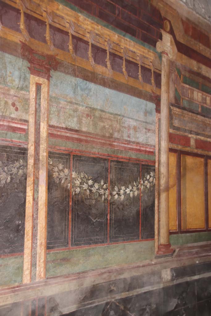 Villa of Mysteries, Pompeii. September 2021.
Room 6, detail of west wall and painted garland. Photo courtesy of Klaus Heese.
