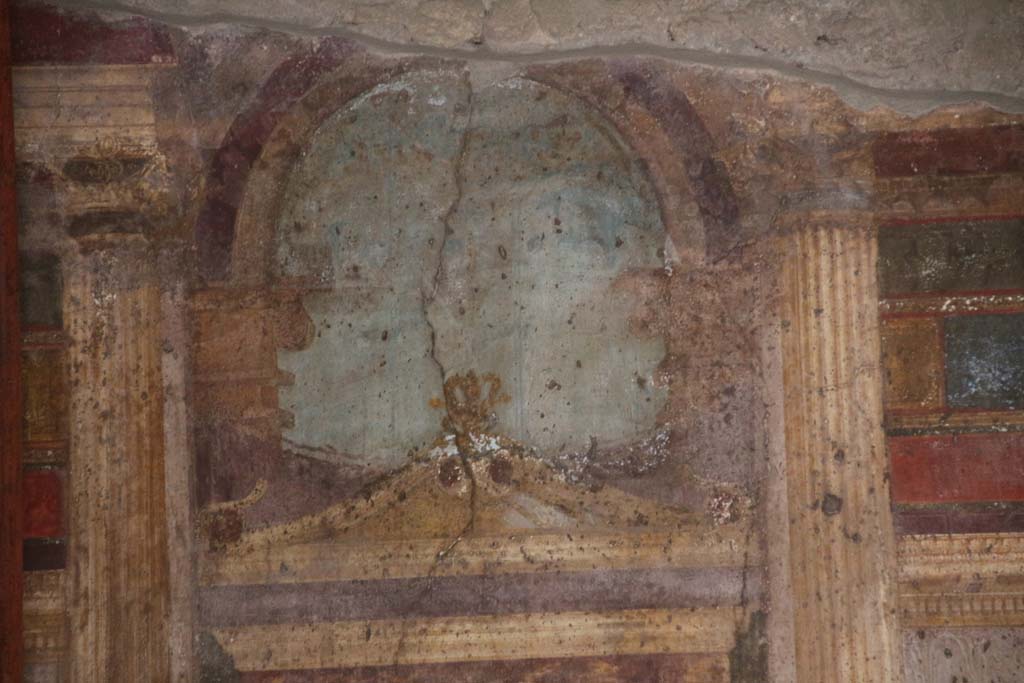 Villa of Mysteries, Pompeii. April 2014. Room 6, detail from north wall above painted doorway in centre.
Photo courtesy of Klaus Heese.