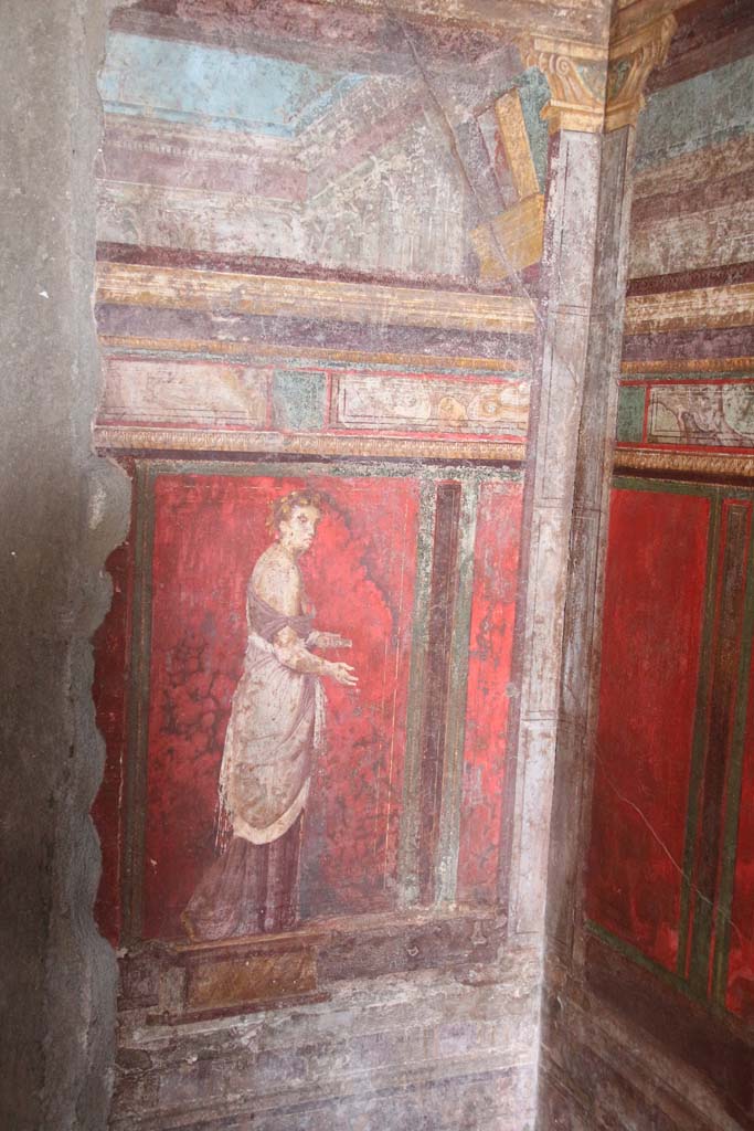 Villa of Mysteries, Pompeii. April 2014.
Room 4, detail of wall painting of a priestess, on east wall.
Photo courtesy of Klaus Heese.