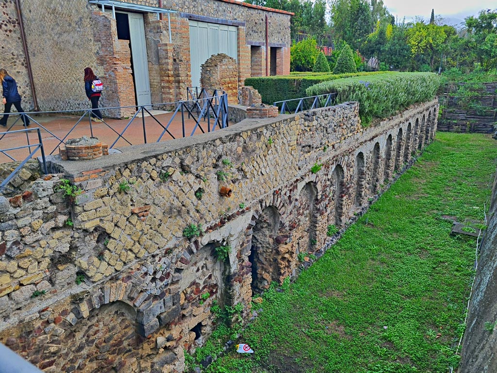 Villa of Mysteries, Pompeii. November 2023.
Looking south-east across exedra towards doorway to portico P2. Photo courtesy of Giuseppe Ciaramella.