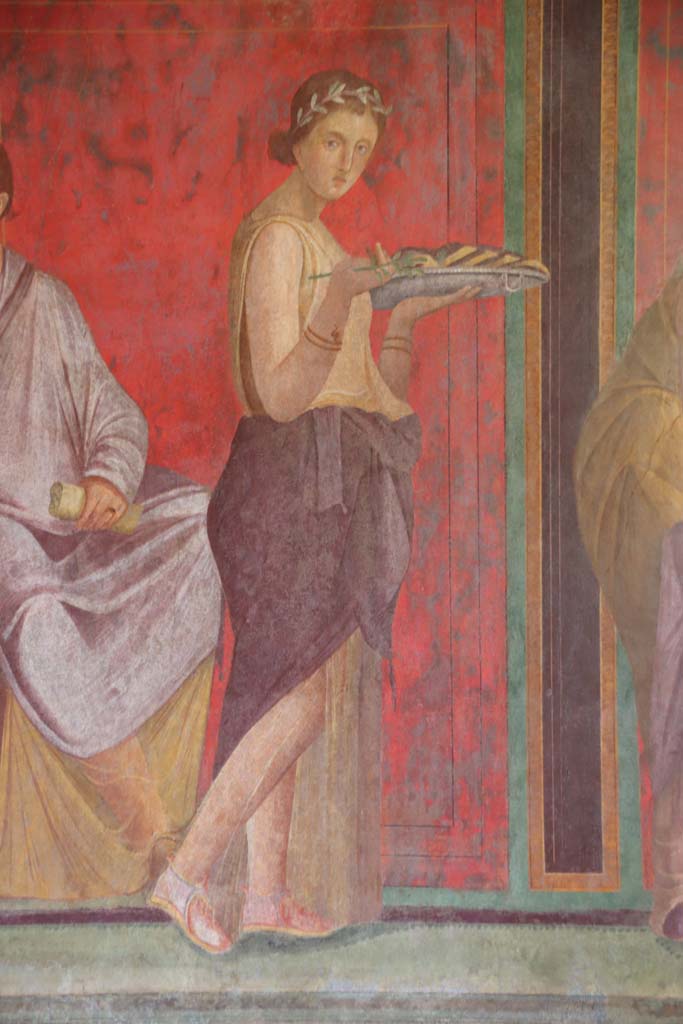 Villa of Mysteries, Pompeii. September 2021.
Room 5, a pregnant young woman offers sacred cakes, detail of figure from north wall.
Photo courtesy of Klaus Heese.
