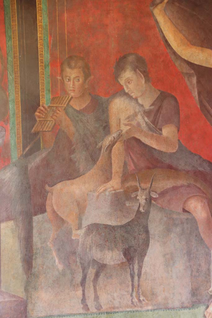 Villa of Mysteries, Pompeii. September 2021.
Room 5, Paniscus, mythological figures who lived in the woods, suckle a kid and play music, detail of figures and goats from north wall.
Photo courtesy of Klaus Heese.