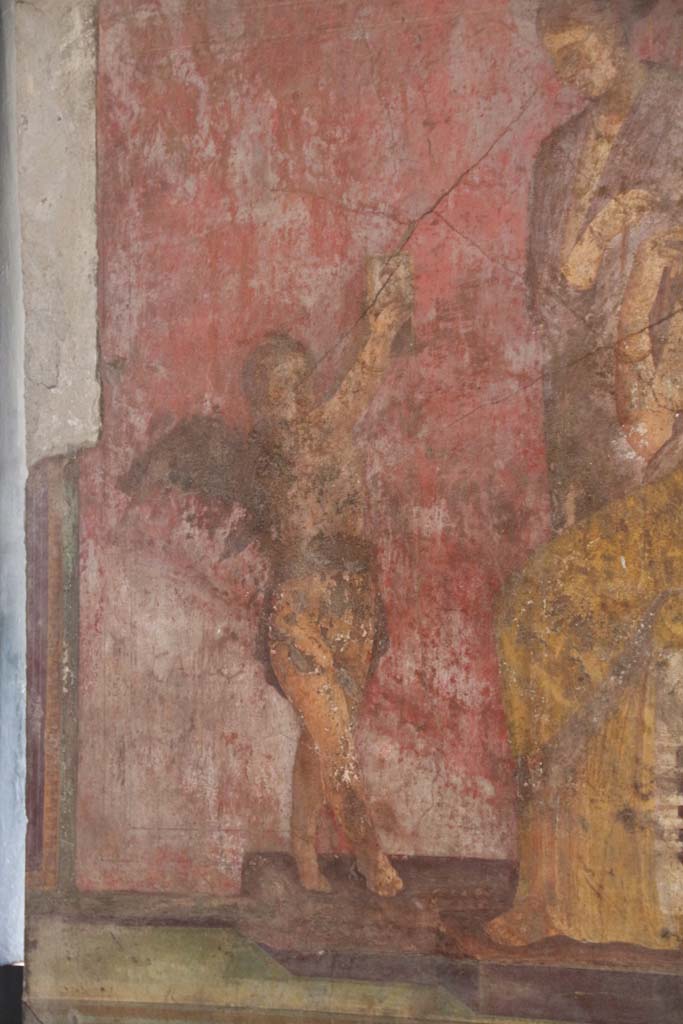Villa of Mysteries, Pompeii. April 2014. Room 5, detail of Eros from south wall.
Photo courtesy of Klaus Heese.