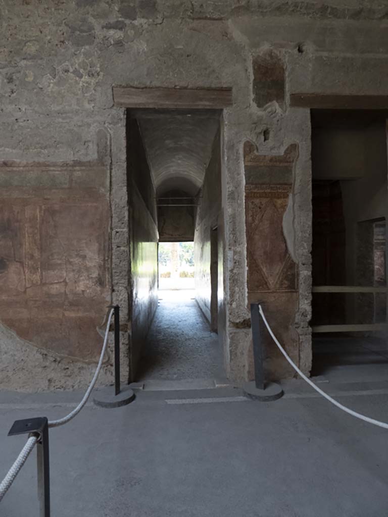 Villa of Mysteries, Pompeii. September 2017.
Room 64, south wall with doorway to corridor F1, in centre, and room 3, on right.
Foto Annette Haug, ERC Grant 681269 DÉCOR.