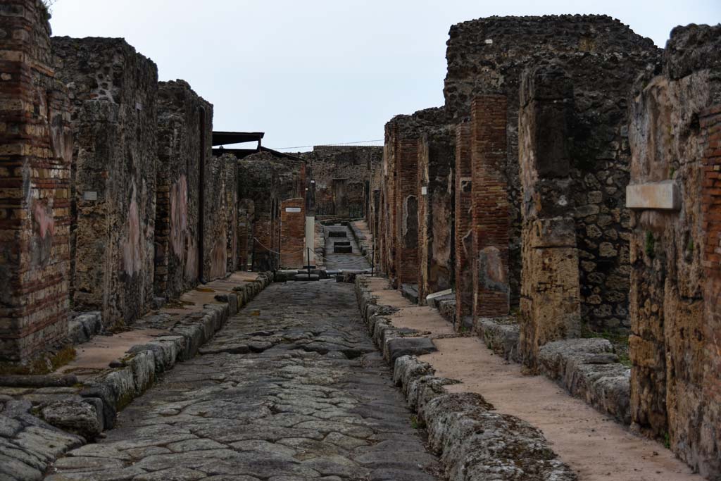 Unnamed vicolo between IX.2 and IX.3. April 2021.
Looking west from IX.3.17, on right, towards crossroads on Via Stabiana and straight ahead to Via degli Augustali. Photo courtesy of Nicolas Monteix.