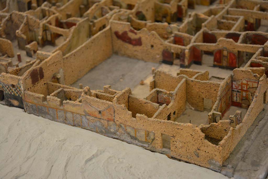 Unnamed vicolo, between IX.5 and IX.6 Pompeii. July 2017. Vicolo del Centenario, on right. Doorways into IX.5.17, on left, and IX.5.16, on right.
From cork model in Naples Archaeological Museum.
Foto Annette Haug, ERC Grant 681269 DÉCOR.
