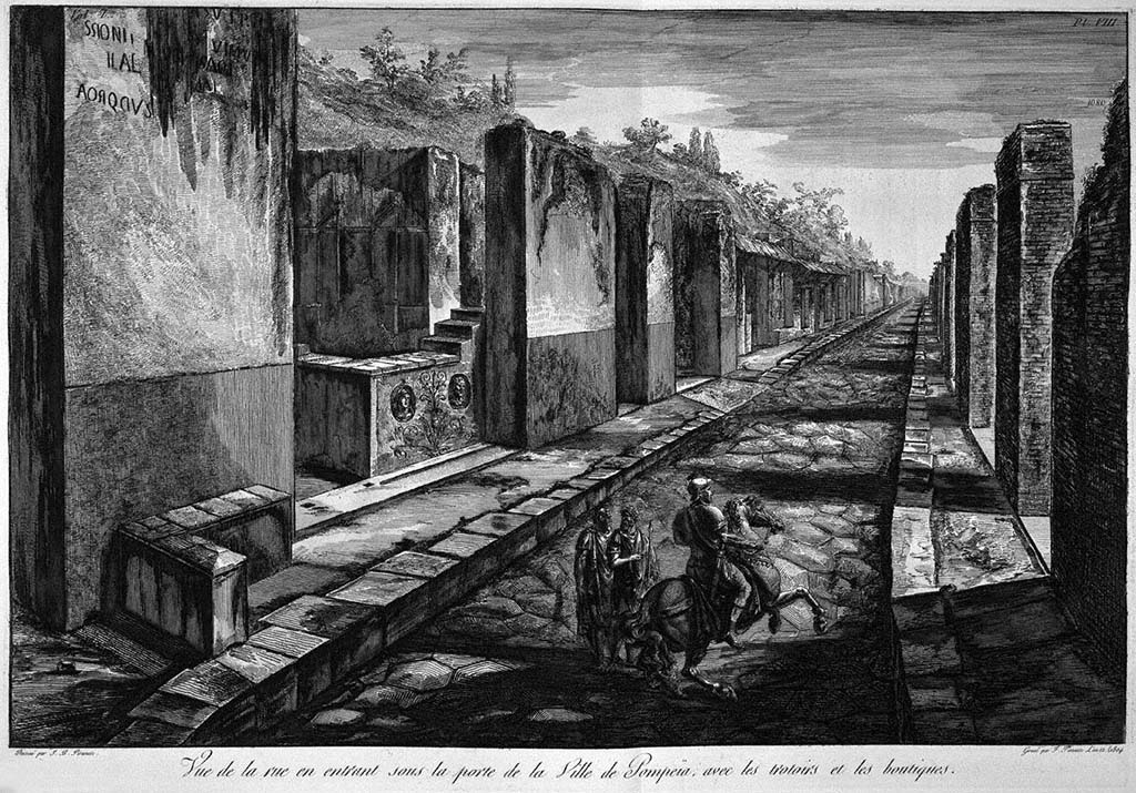 Via Consolare, Pompeii. Pre-1778 drawing by G. B. Piranesi, published by F Piranesi in 1804.
Looking south, with the bar-counter with decorative heads at VI.1.2. visible on the left.
Foto Taylor Lauritsen, ERC Grant 681269 DÉCOR.
See Piranesi, F, 1804. Antiquités de la Grande Grèce: Tome I. Paris: Piranesi and Le Blanc, Pl. VIII.