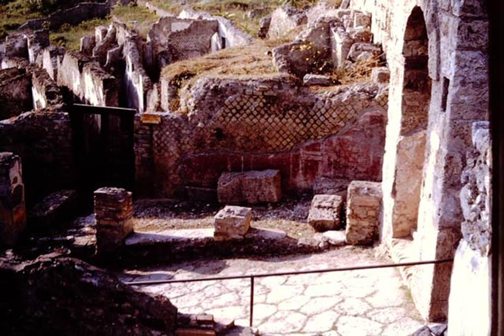 Via Marina. Pompeii. 1964. Looking north across Via Marina towards exterior wall of Suburban Baths, and Porta Martina on the right. Photo by Stanley A. Jashemski.
Source: The Wilhelmina and Stanley A. Jashemski archive in the University of Maryland Library, Special Collections (See collection page) and made available under the Creative Commons Attribution-Non Commercial License v.4. See Licence and use details.
J64f1737