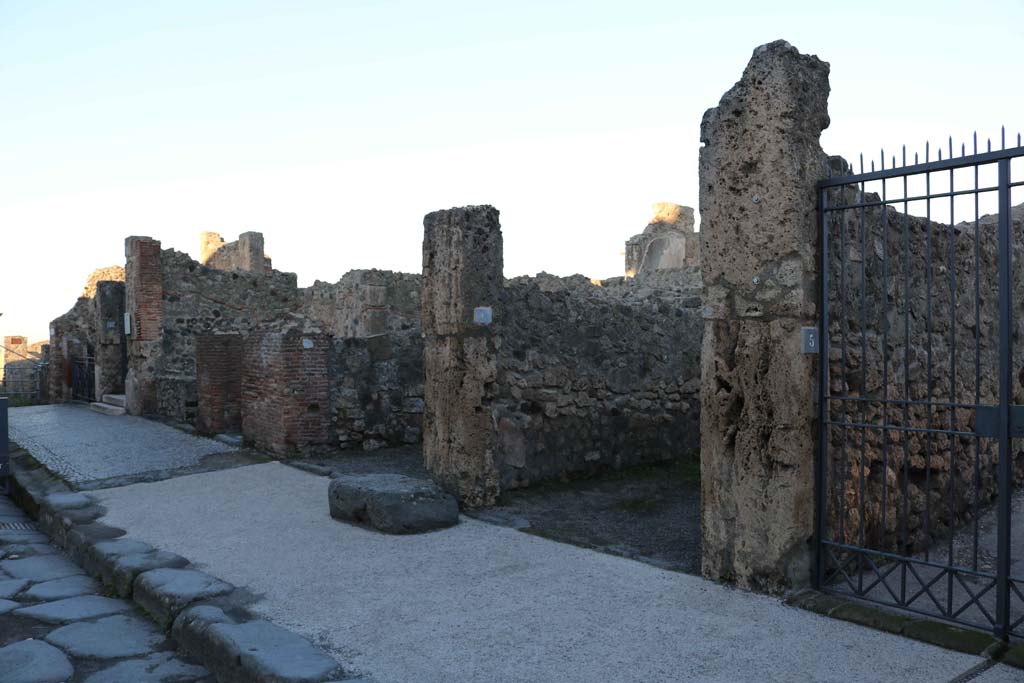 Via Marina, north side, Pompeii. December 2018.
Looking north-west from VII.7.11, on left, to VII.7.5, on right. Photo courtesy of Aude Durand