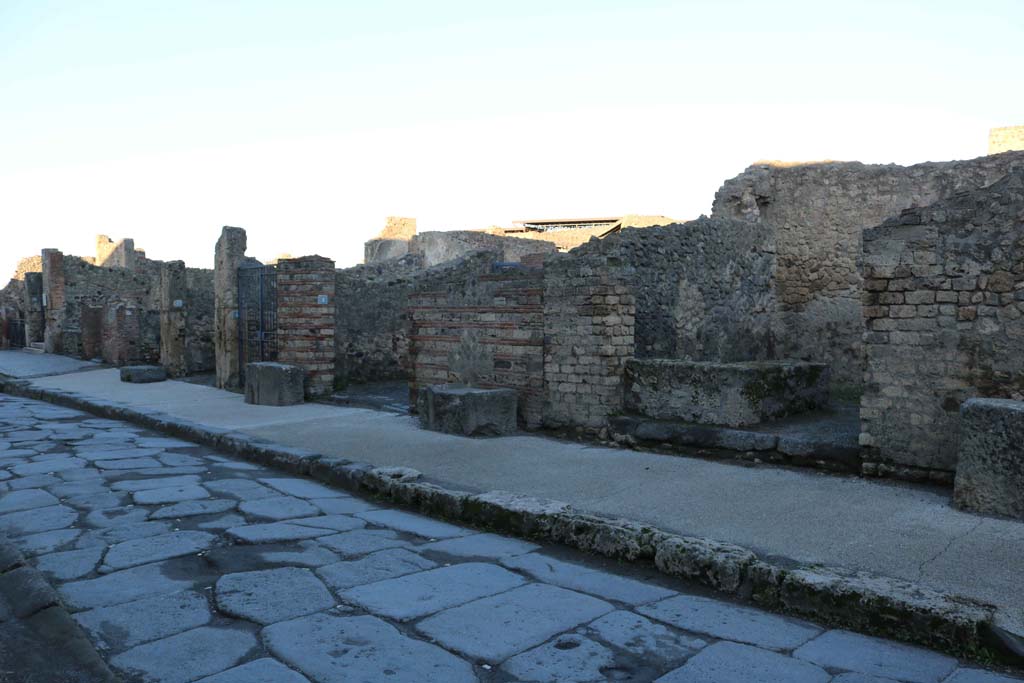 Via Marina, north side, Pompeii. December 2018.
Looking north-west towards VII.7.10, on left, and VII.7.3, on right. Photo courtesy of Aude Durand.