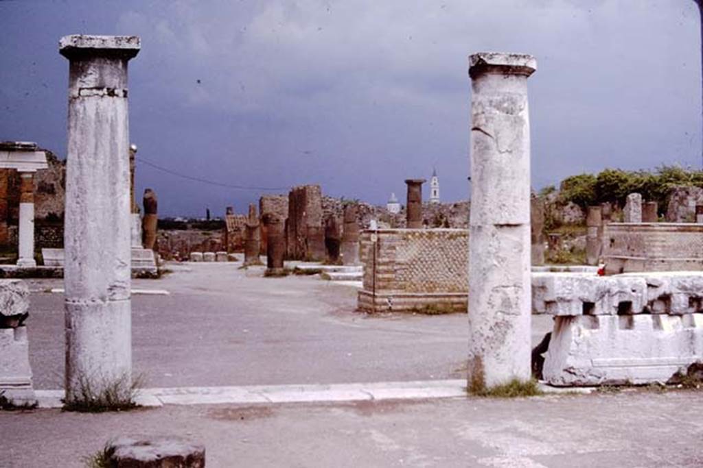 Via Marina, Pompeii. 1964. Looking east onto the Forum, at the eastern end of the Via Marina. Photo by Stanley A. Jashemski.
Source: The Wilhelmina and Stanley A. Jashemski archive in the University of Maryland Library, Special Collections (See collection page) and made available under the Creative Commons Attribution-Non Commercial License v.4. See Licence and use details.
J64f0991