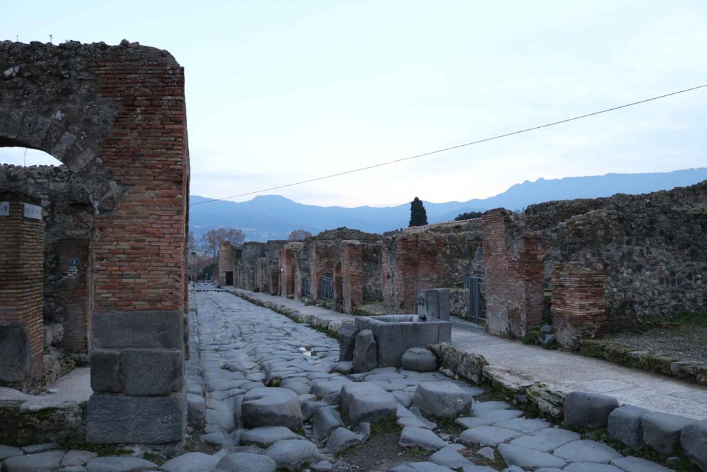 Via Stabiana, at IX.2.1, Pompeii, on left. December 2018.
Looking south between IX.2, on left, and VII.1, on right. Photo courtesy of Aude Durand.