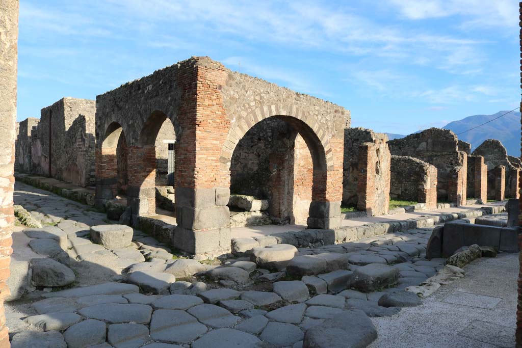Via Stabiana, Pompeii, on right. December 2018.
Looking east from junction with unnamed vicolo between IX.3 and IX.2. Photo courtesy of Aude Durand.