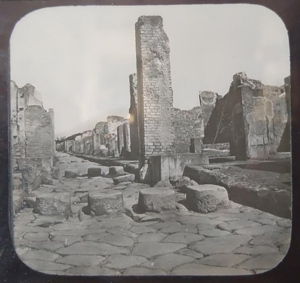 Via Stabiana, Pompeii. c.1900. C. and G. Lantern slide published by A. Laverne.
Looking north-east across Holconius’ crossroads, with Via Stabiana, in centre, and Via dell’Abbondanza, on right.
