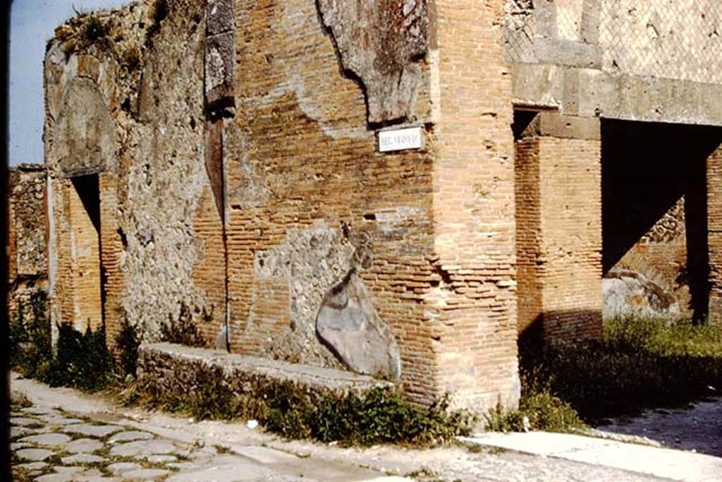 Via degli Augustali, Pompeii. 1961. Looking towards the bench on the south side of the road, at the side of the entrance to the Forum. Photo by Stanley A. Jashemski.
Source: The Wilhelmina and Stanley A. Jashemski archive in the University of Maryland Library, Special Collections (See collection page) and made available under the Creative Commons Attribution-Non Commercial License v.4. See Licence and use details.
J61f0653