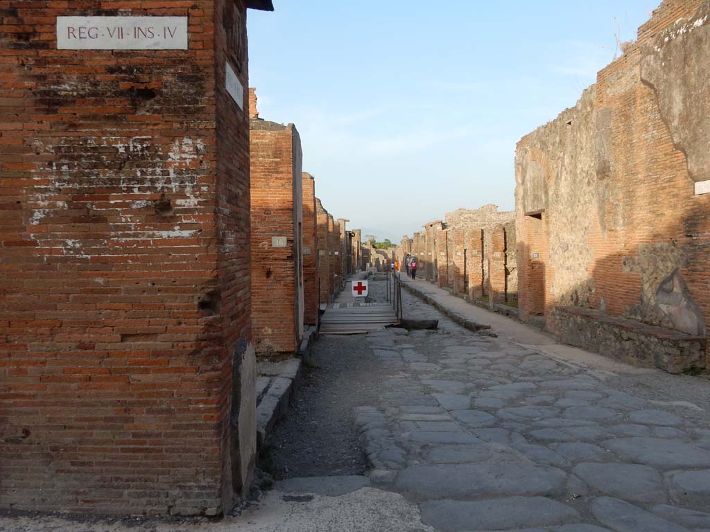 Via degli Augustali, Pompeii. June 2019. Looking east along Via degli Augustali between VII.4 and VII.9.
Photo courtesy of Buzz Ferebee.