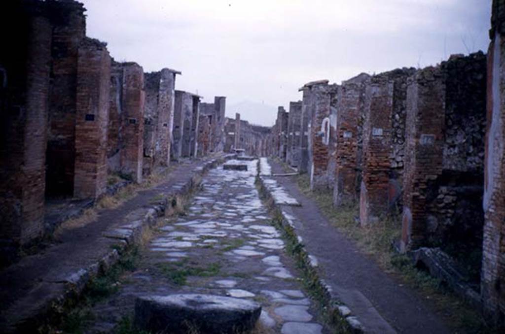 Via degli Augustali, February 1952. Looking east from near VII.4.18, on the left, and VII.9.14, on the right. Photo courtesy of John Vanko. His father took this photo in 1952, identical to the one above.