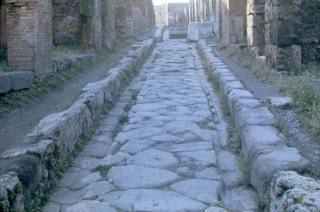 Via degli Augustali, between VII.12 and VII.2. 4th December 1971. Looking west at road surface.
Photo courtesy of Rick Bauer, from Dr George Fay’s slides collection.