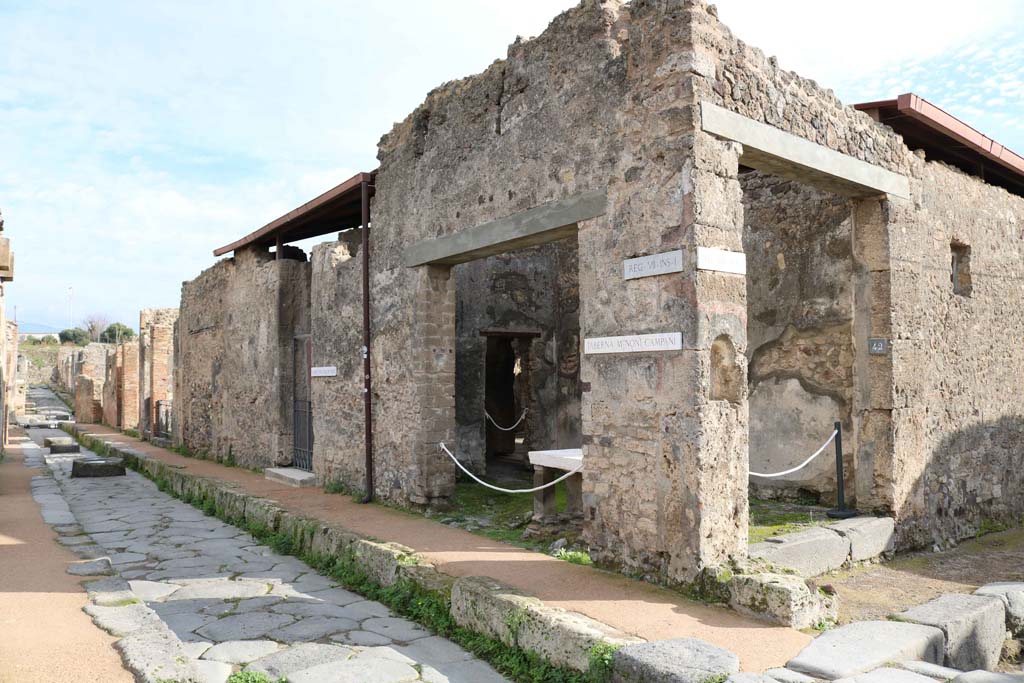 Via degli Augustali, Pompeii. December 2018.
Looking east from near junction with Vicolo del Lupanare, on right. Photo courtesy of Aude Durand.