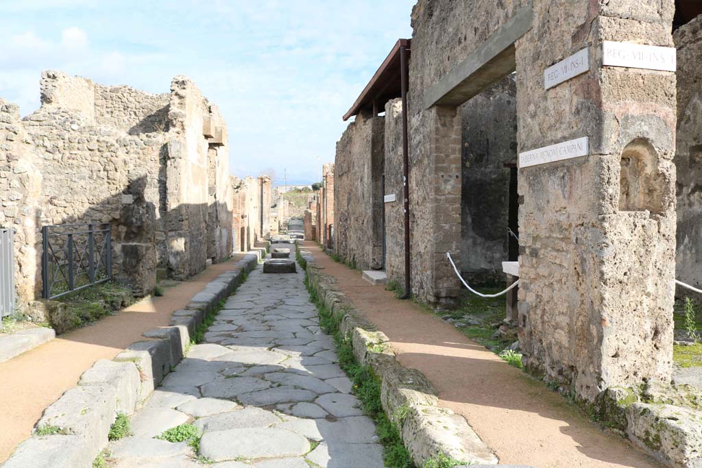Via degli Augustali, Pompeii. December 2018.
Looking east between VII.2, on left, and VII.1.41, on right. Photo courtesy of Aude Durand.