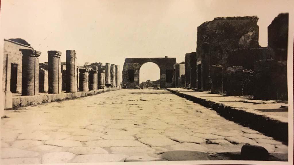 Via del Foro, Pompeii. From an album dated 1928. Looking south between VII.4, on left and VII.5, on right.
Photo courtesy of Rick Bauer.