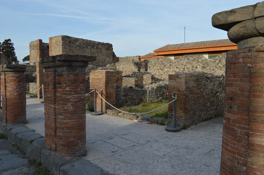Via del Foro, east side, Pompeii. March 2019.
Looking north-east from fourth pilaster/column, on right, towards VII.4.7, and fifth and sixth pilaster/columns.
Foto Taylor Lauritsen, ERC Grant 681269 DÉCOR.