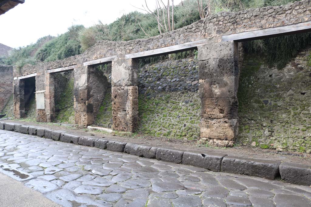 Via dell’Abbondanza, north side. Pompeii. December 2018.
Looking west from III.1.5, on right, towards III.1.1, on left. Photo courtesy of Aude Durand.