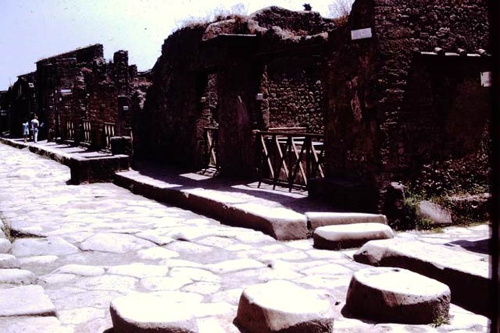 Via dell’Abbondanza, south side. Pompeii. 1972. Looking east along II.1 from junction with Via di Nocera. Photo by Stanley A. Jashemski.
Source: The Wilhelmina and Stanley A. Jashemski archive in the University of Maryland Library, Special Collections (See collection page) and made available under the Creative Commons Attribution-Non Commercial License v.4. See Licence and use details. J72f0055