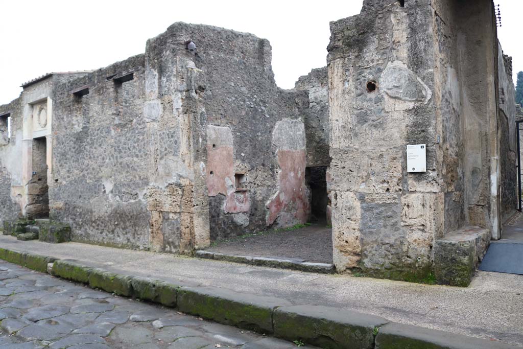 Via dell’Abbondanza, Pompeii. December 2018.
Looking east along II.2, from II.2.4, on left, with II.2.3, in centre, and II.2.2, on right. Photo courtesy of Aude Durand.