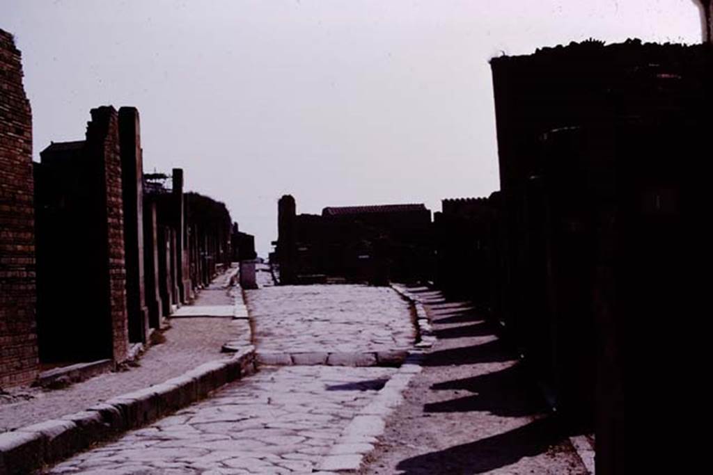 Via dell’Abbondanza, Pompeii. 1975. Looking east between VII.1 and VIII.4. Photo by Stanley A. Jashemski.
Source: The Wilhelmina and Stanley A. Jashemski archive in the University of Maryland Library, Special Collections (See collection page) and made available under the Creative Commons Attribution-Non Commercial License v.4. See Licence and use details. J75f0374