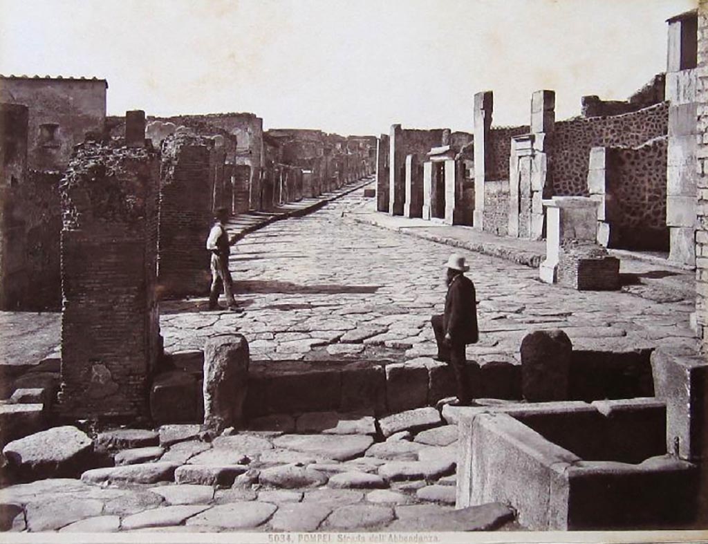 Via dell’Abbondanza, Pompeii.
Looking west from Holconius’ crossroads, with VIII.4, on left, and VII.1, on right.
Photograph No. 5034, by Giacomo Brogi (1822-1881). Public domain, via Wikimedia Commons