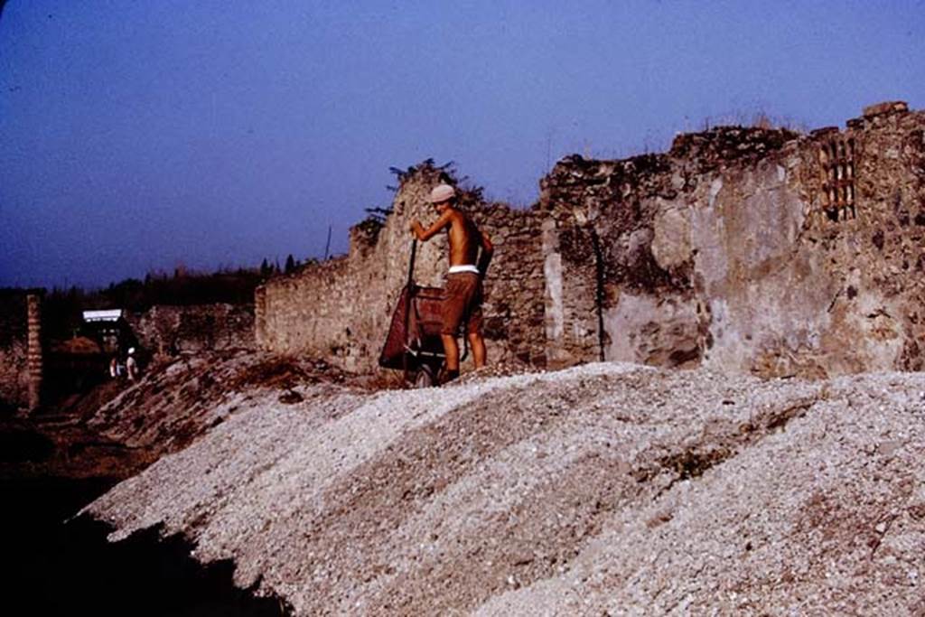 Via della Palestra between I.20 and I.14. Pompeii. 1972. Looking west. Photo by Stanley A. Jashemski.
Source: The Wilhelmina and Stanley A. Jashemski archive in the University of Maryland Library, Special Collections (See collection page) and made available under the Creative Commons Attribution-Non Commercial License v.4. See Licence and use details. J72f0628