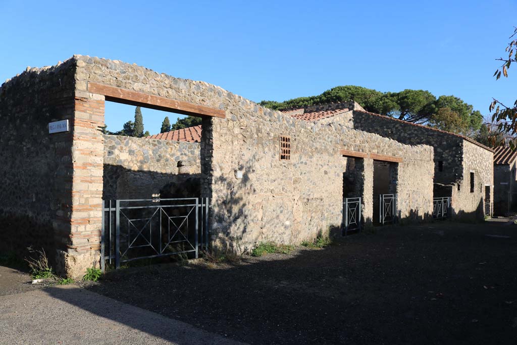 Via della Palestra, Pompeii, north side. December 2018.
Looking east from I.14.11 towards I.14.15, on right. Photo courtesy of Aude Durand.