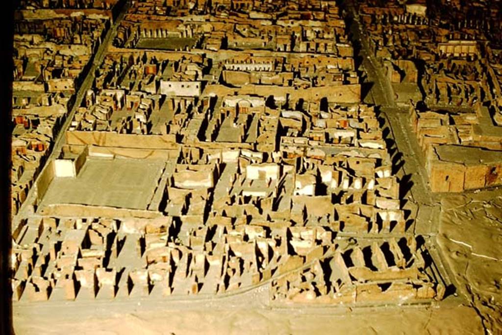 Via delle Terme, on right of photo. 1957. Photo by Stanley A. Jashemski. Looking east across model in Naples Museum, with VI.3 lower left, and VI.4 separated by Via Consolare. Followed by VI.6 with large garden area (House of Pansa), and on the other side of Via Delle Terme, on the right, the Forum Baths.
Source: The Wilhelmina and Stanley A. Jashemski archive in the University of Maryland Library, Special Collections (See collection page) and made available under the Creative Commons Attribution-Non Commercial License v.4. See Licence and use details. J57f0554