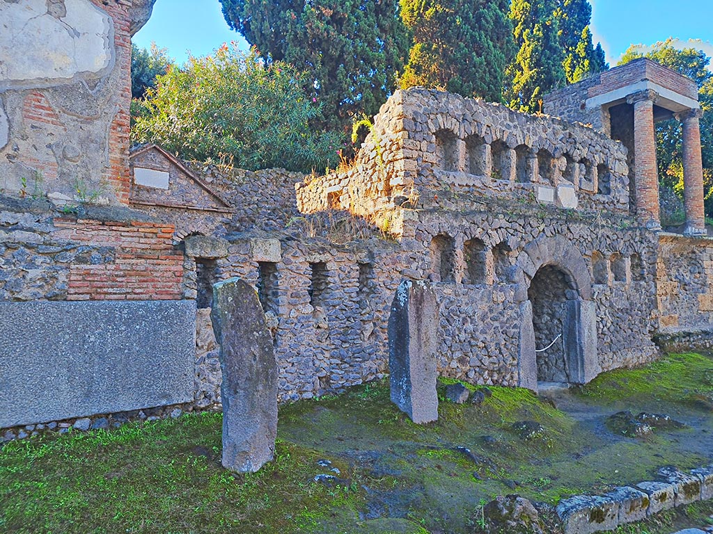 Via delle Tombe, south side, Pompeii. October 2024.
Looking west along south side of Via delle Tombe from Tomb 1OS, on left, with Tomb 50S, in centre. Photo courtesy of Giuseppe Ciaramella.