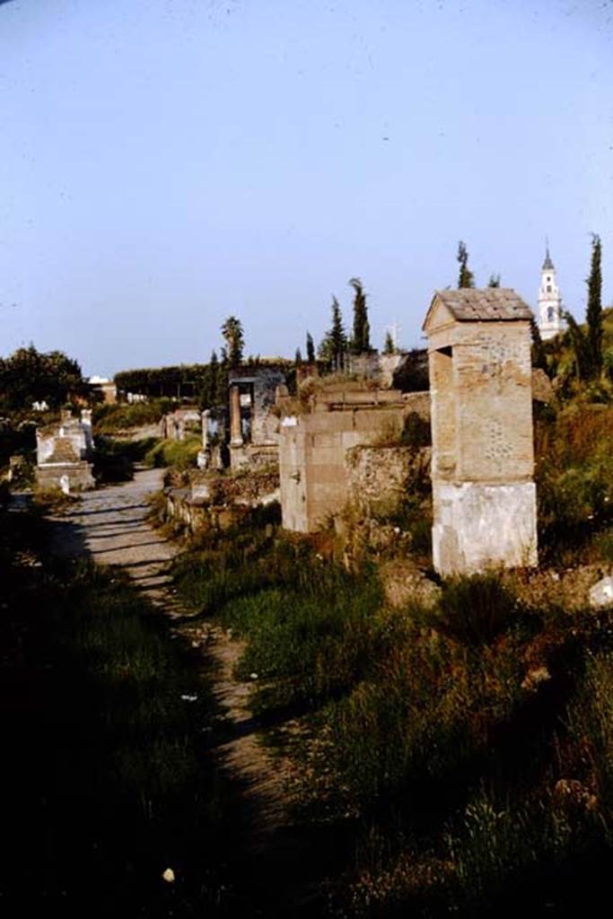 Via delle Tombe, south side. 1964. Looking east towards the junction with Via di Nocera, from Tomb 23OS.
Photo by Stanley A. Jashemski.
Source: The Wilhelmina and Stanley A. Jashemski archive in the University of Maryland Library, Special Collections (See collection page) and made available under the Creative Commons Attribution-Non Commercial License v.4. See Licence and use details.
J64f1653