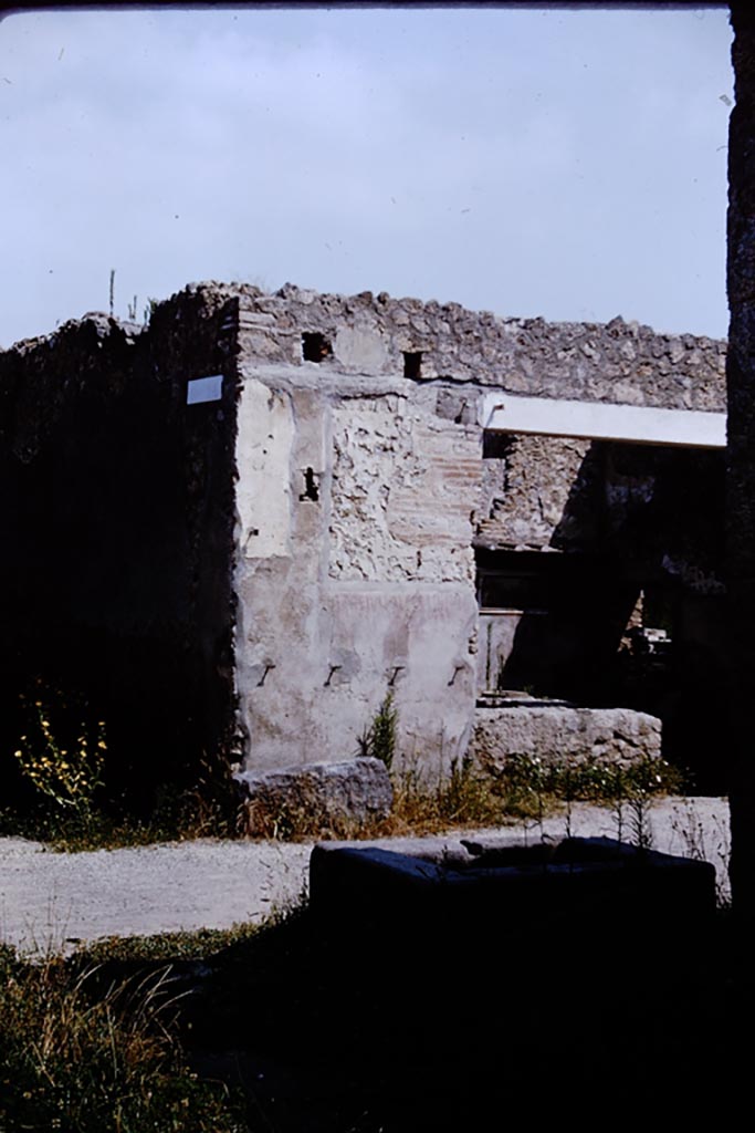 Via di Castricio, north side, Pompeii. 1964. Looking north towards I.11.11, from fountain at I.16.4
Below the site of the sign of the Phoenix, CIL IV 9851 can still be read. Photo by Stanley A. Jashemski.
Source: The Wilhelmina and Stanley A. Jashemski archive in the University of Maryland Library, Special Collections (See collection page) and made available under the Creative Commons Attribution-Non-Commercial License v.4. See Licence and use details.
J64f1492