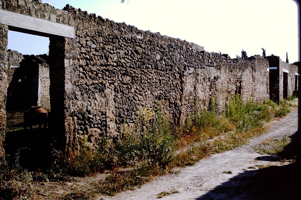 Via di Castricio, north side, Pompeii. 1964.
Looking east along north side, with I.11.10 doorway, on left. Photo by Stanley A. Jashemski.
Source: The Wilhelmina and Stanley A. Jashemski archive in the University of Maryland Library, Special Collections (See collection page) and made available under the Creative Commons Attribution-Non-Commercial License v.4. See Licence and use details.
J64f1524