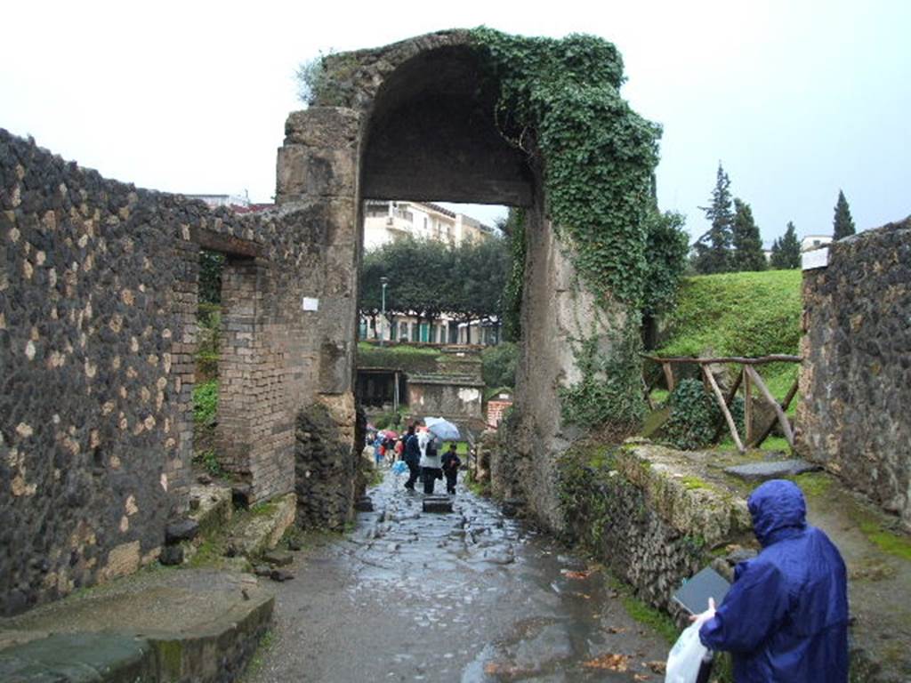 Via di Nocera, December 2004. Looking south through Porta Nocera out of the city.