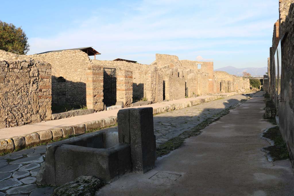 Via di Nola, north side, December 2018.
Looking north-east along insula V.3 and V.4, from near fountain at IX.8.1. Photo courtesy of Aude Durand.