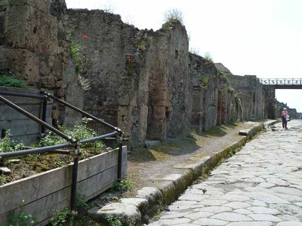 Via di Nola, south side, May 2010. Looking west along III.8 from near unexcavated vicolo.