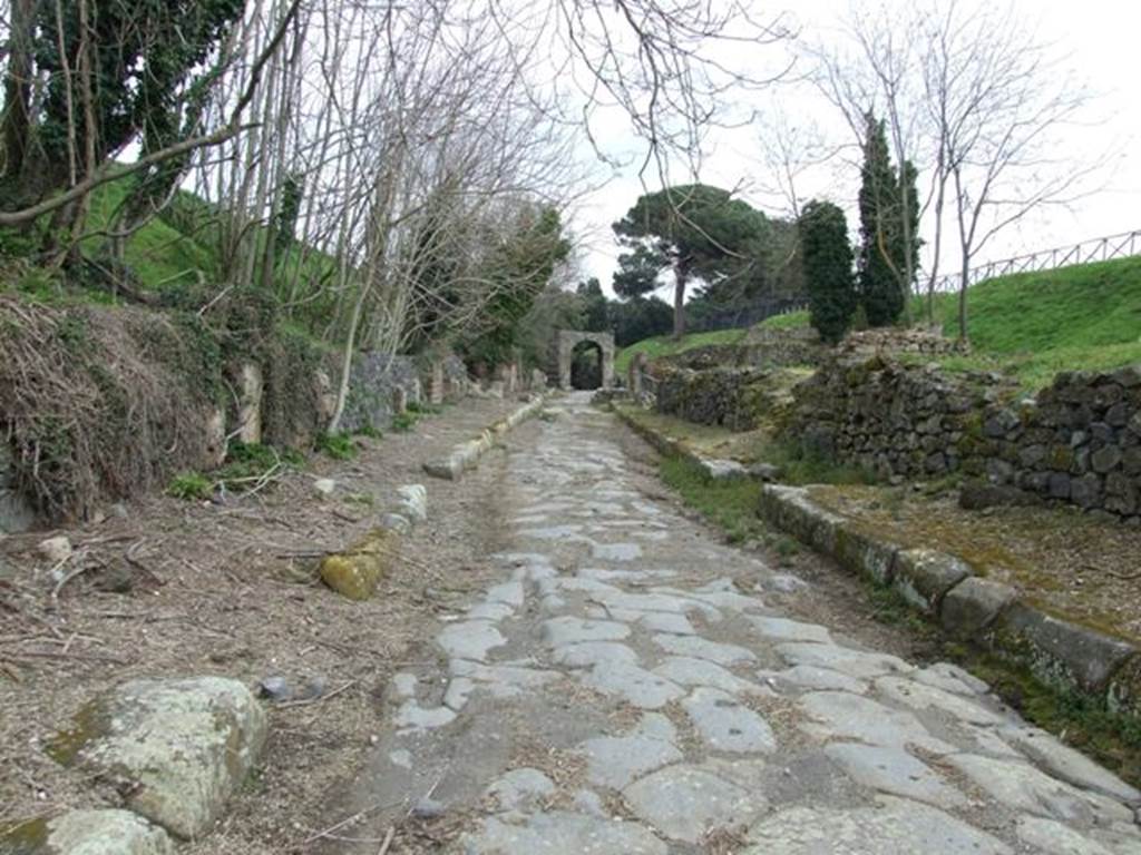 Via di Nola. March 2009. Looking east between IV.3 and III.9.