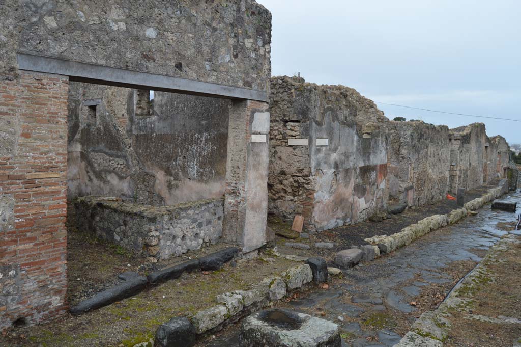 Vicolo dei Soprastanti, Pompeii. March 2018.
Looking west along south side, with VII.7.18, on left, followed by Vicolo del Gallo, and VII.15.12.
Foto Taylor Lauritsen, ERC Grant 681269 DÉCOR.