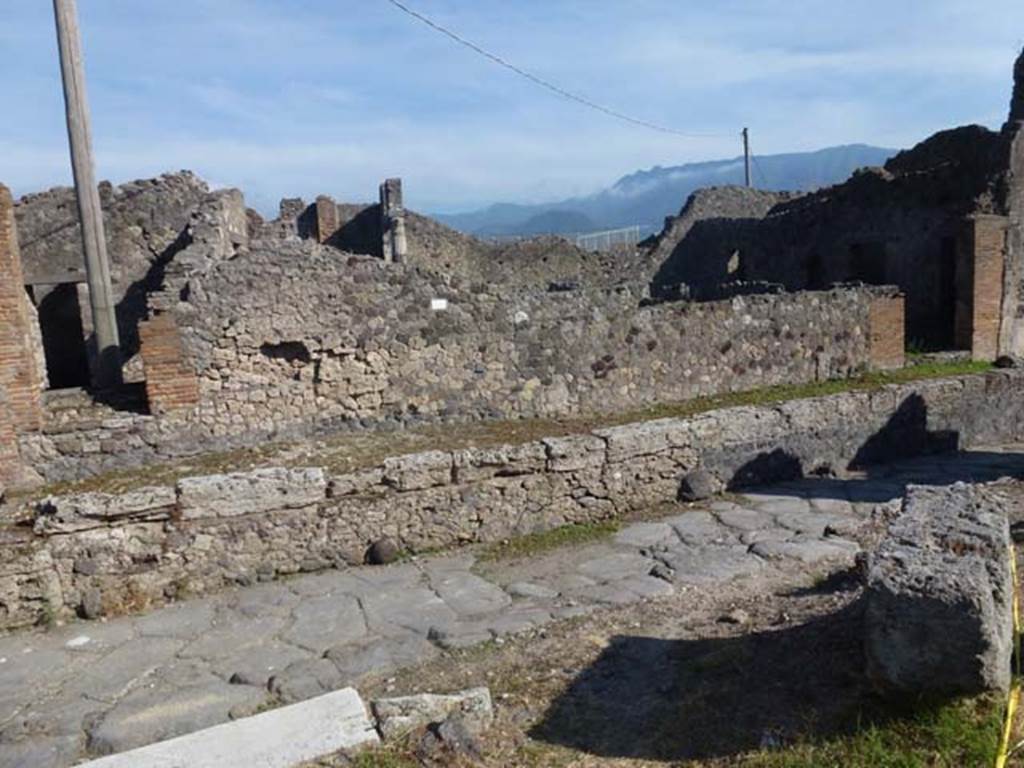 Vicolo dei Soprastanti, south side. June 2012. Looking towards south side, with doorways to VII.7.20 and VII.7.19, from VII.6.28.