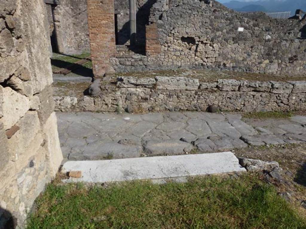Vicolo dei Soprastanti, south side. June 2012. Looking towards south side from white threshold of VII.6.28.