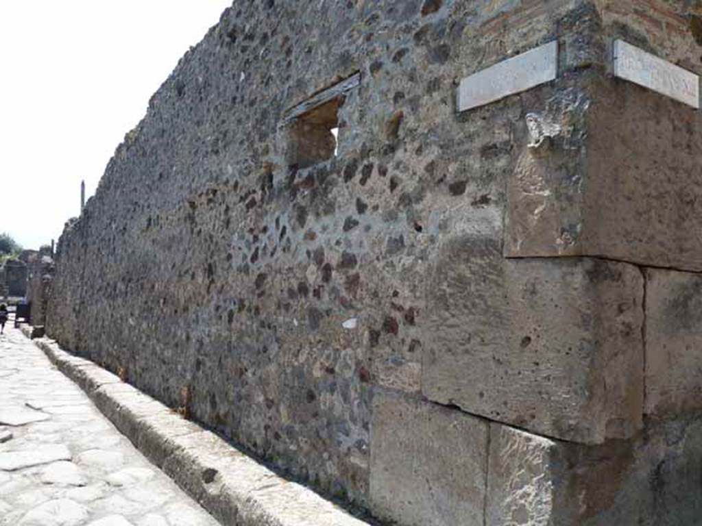Vicolo della Maschera, west side, May 2010. Looking south along VII.13, from corner of VII.13.14.