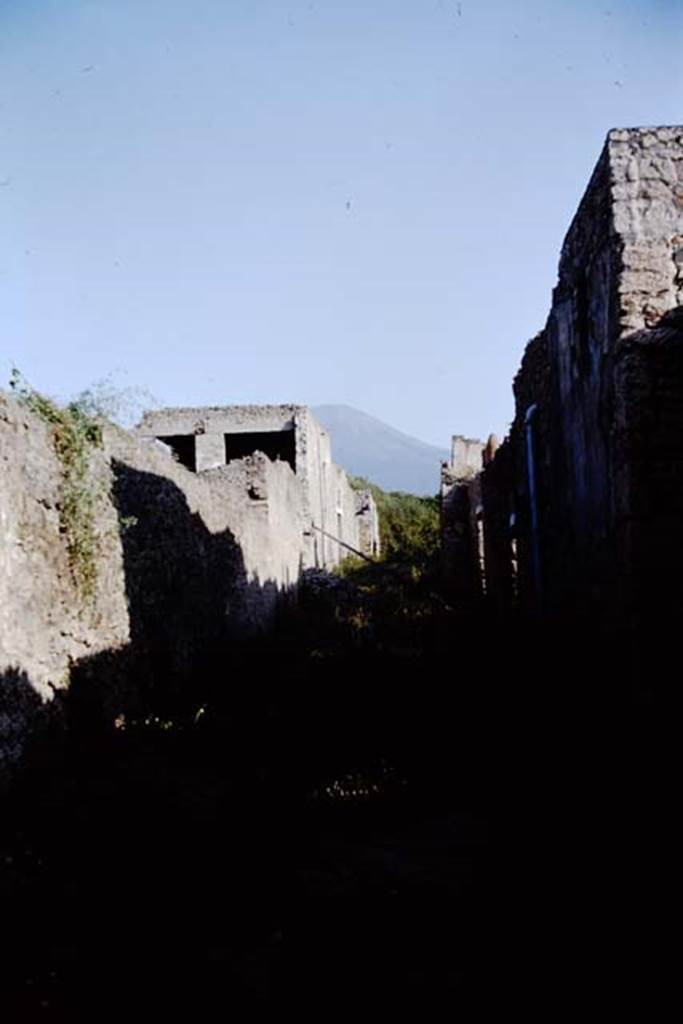 Vicolo della Nave Europa between I.11 and I.12, Pompeii. 1964. Looking north.
Photo by Stanley A. Jashemski.
Source: The Wilhelmina and Stanley A. Jashemski archive in the University of Maryland Library, Special Collections (See collection page) and made available under the Creative Commons Attribution-Non Commercial License v.4. See Licence and use details.
J64f1513